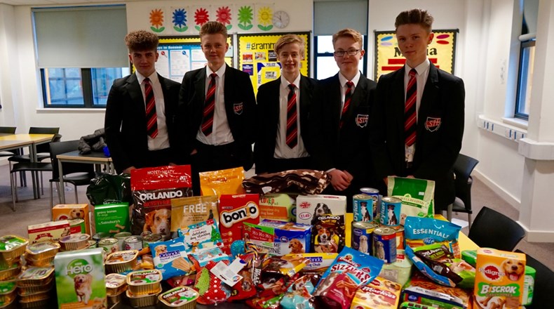 Year 10 collect dozens of dog food donations